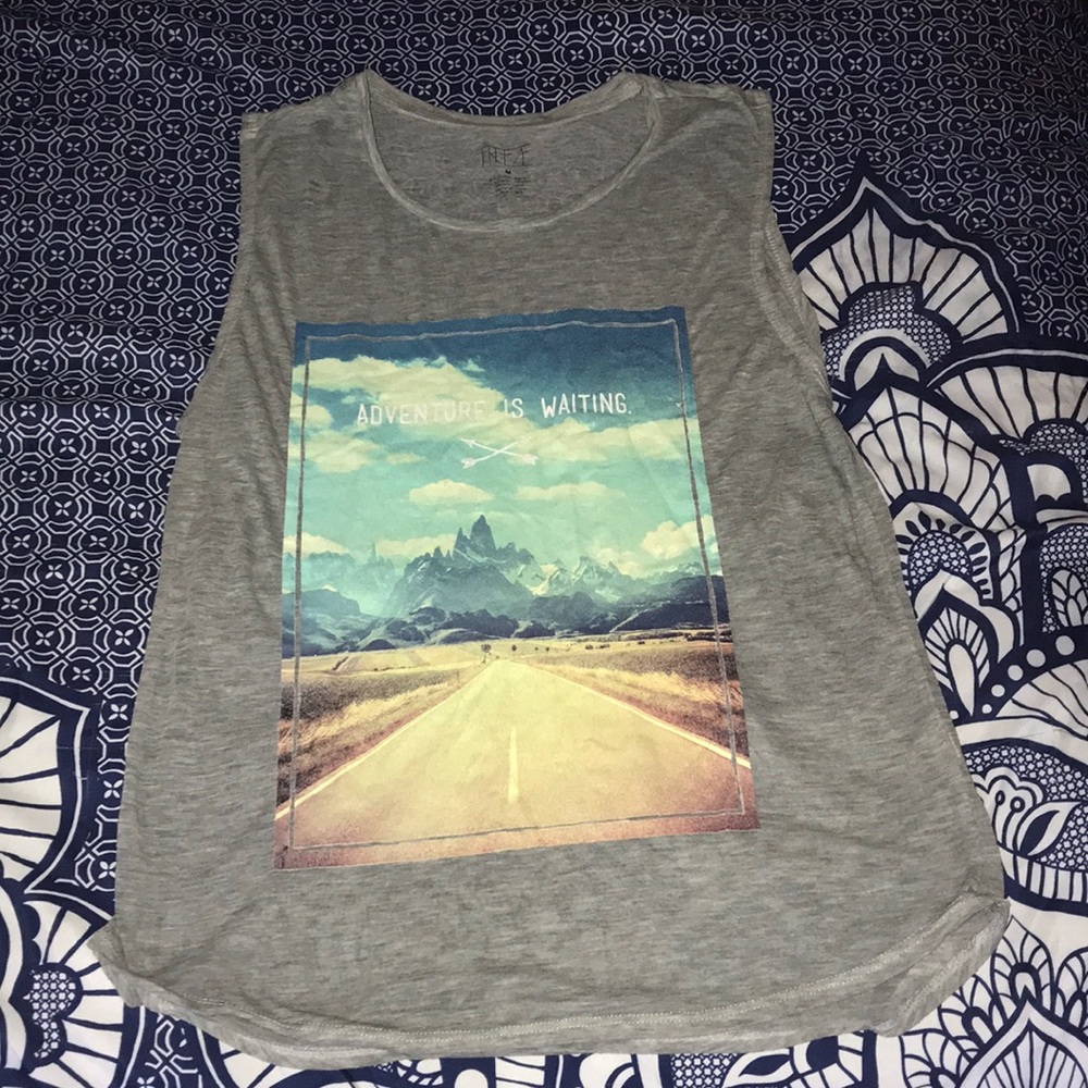 Flowy, somewhat sheer gray tank